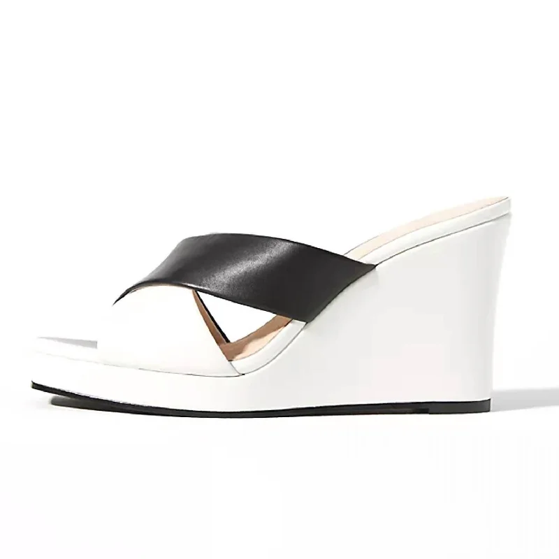 Women's teal stiletto heel pumps for a unique and modern lookWesley Heels In Black/white