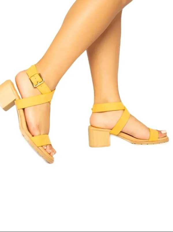 Women's Sandals with a Wedge Heel and a Tassel Detail in Orange for a Trendy LookBarden Strappy Sandals In Mustard