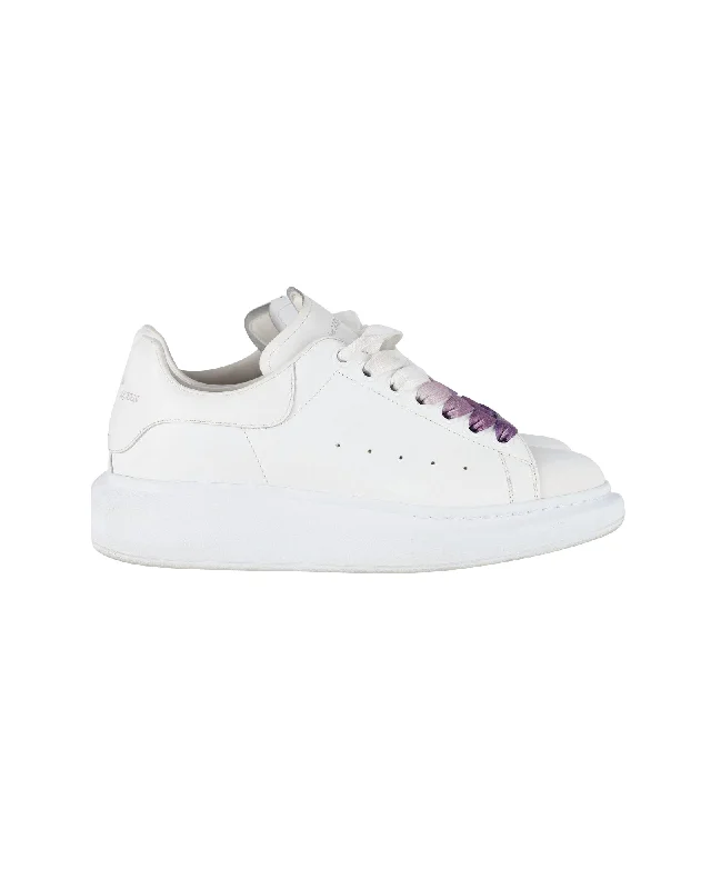 Foldable Women's Travel Sneakers for Compact Storage in LuggageAlexander McQueen Oversized Sneakers in White Calfskin Leather