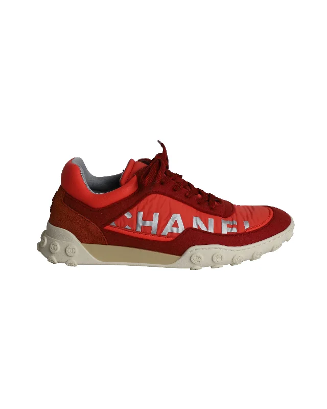 Vegan - Friendly Women's Sneakers Made from Recycled Materials for an Eco - Conscious ChoiceChanel CC Logo Low Top Sneakers in Red and Neon Orange Leather and Fabric