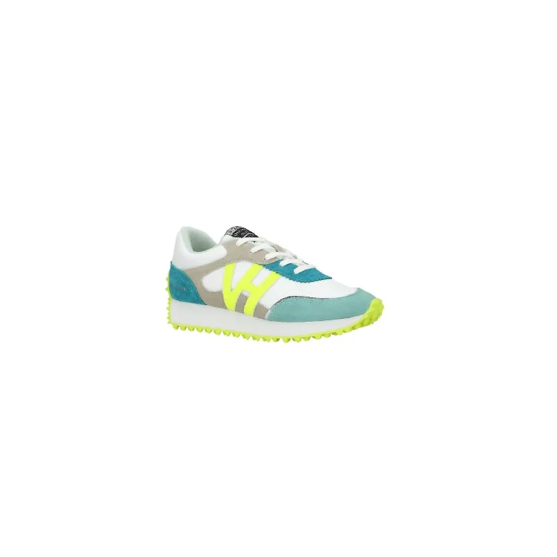 Low - Top Women's Tennis Sneakers in Bright Neon for a Pop of Color on the CourtWomen's Cosmic 5 Sneakers In Neon Yellow