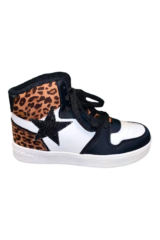 Low - Top Women's Tennis Sneakers in Bright Neon for a Pop of Color on the CourtWomen's Glitter Star Hightop Sneakers In Black Multi