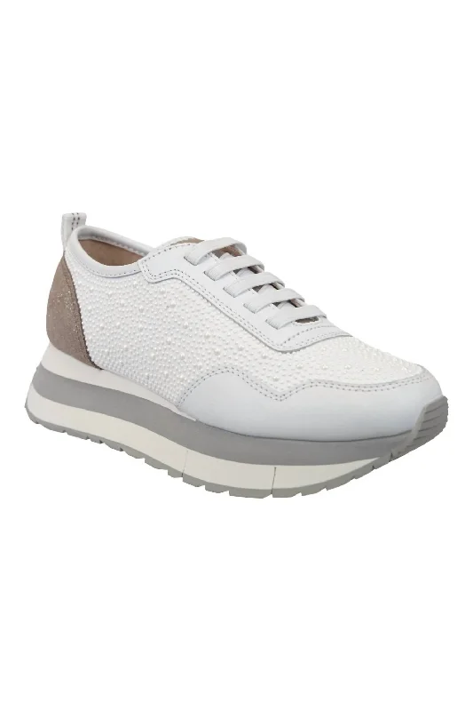 Low - Top Women's Tennis Sneakers in Bright Neon for a Pop of Color on the CourtWomen's Kinetic Platform Sneakers In White Pearl